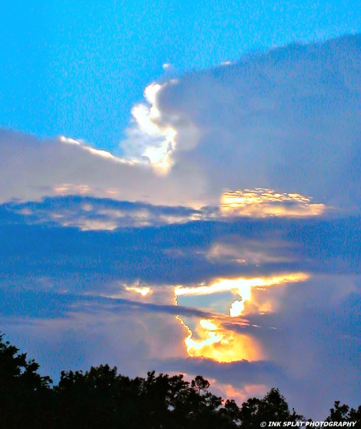 Sun breaking through a Storm Cloud
