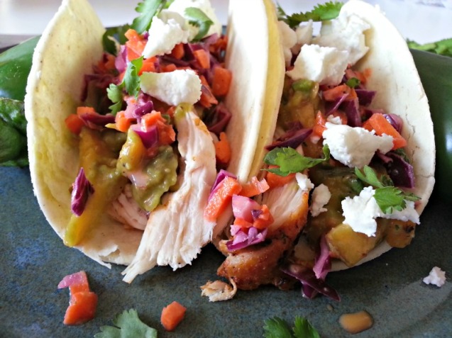Blackened Chicken Tacos with Grilles Peach & Avocado Salsa, Asian Slaw and Goat Cheese